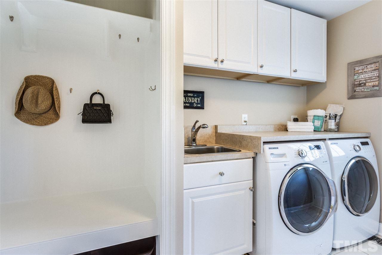 9004 Shellwood Court Raleigh, NC 27617 - Photo 10 of 25 a view of living room washer and dryer