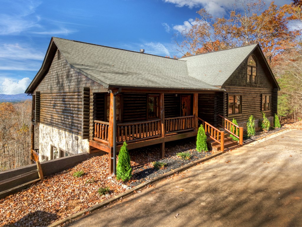 180 Cinnamon Bear Road Mineral Bluff, GA 30559 - Photo 12 of 76 a view of a house with a wooden fence