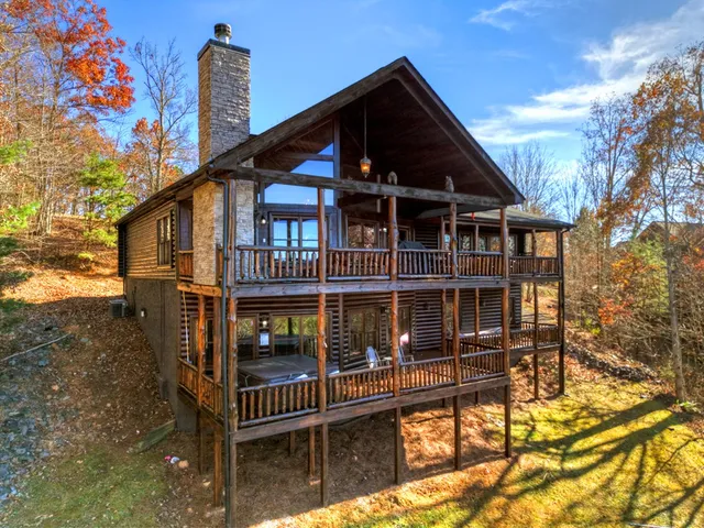 a view of a porch with wooden floor and outdoor space