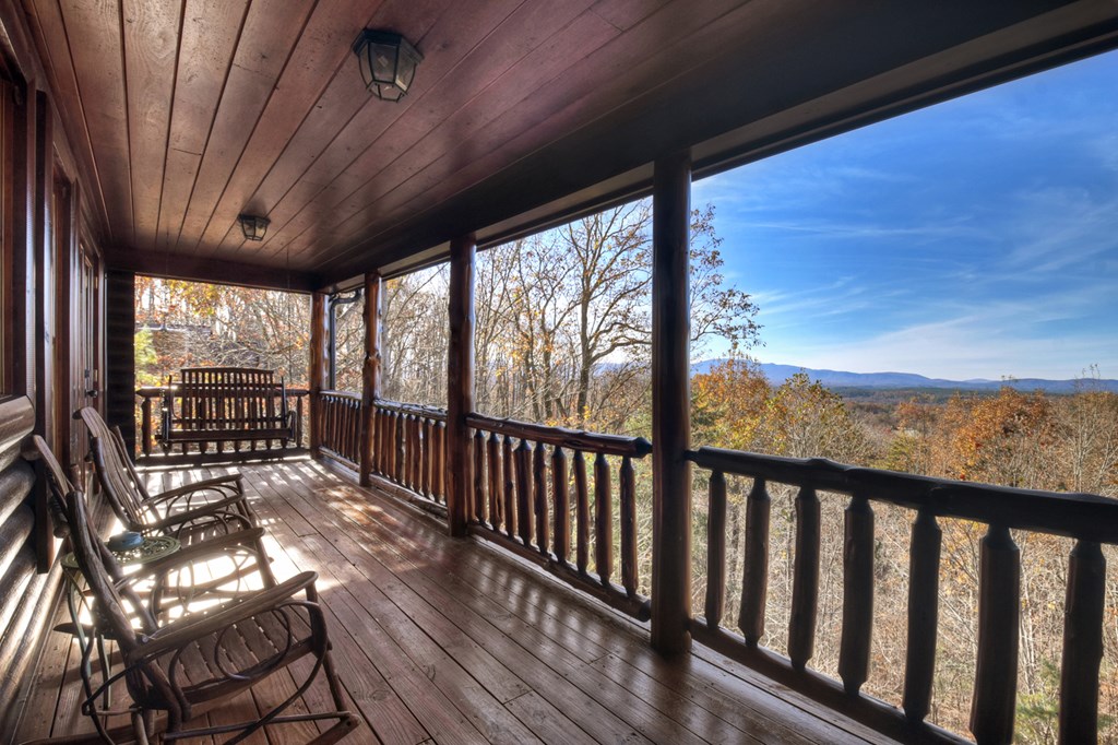 180 Cinnamon Bear Road Mineral Bluff, GA 30559 - Photo 26 of 76 a view of balcony with wooden floor