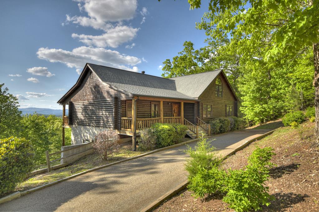 180 Cinnamon Bear Road Mineral Bluff, GA 30559 - Photo 10 of 76 a view of a house with backyard and garden
