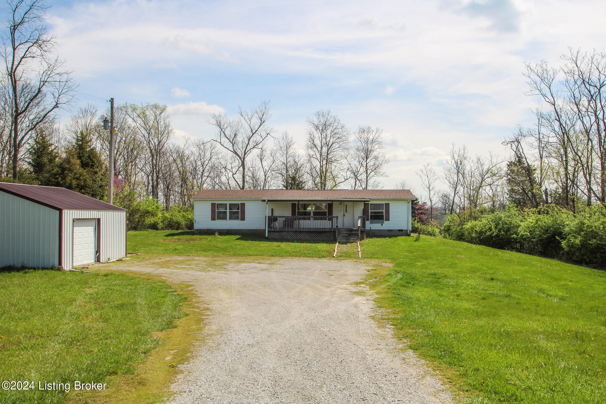 686 Windy Ridge Road Bedford, KY 40006 - Photo 1 of 42 Welcome Home! Featuring 5 acres, detached garage and more