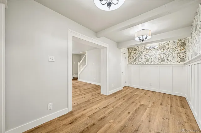 wooden floor in a hall with an entryway