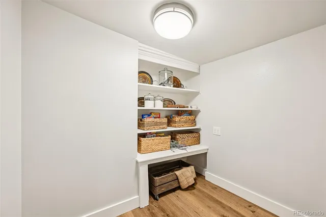 a view of small space with wooden floor