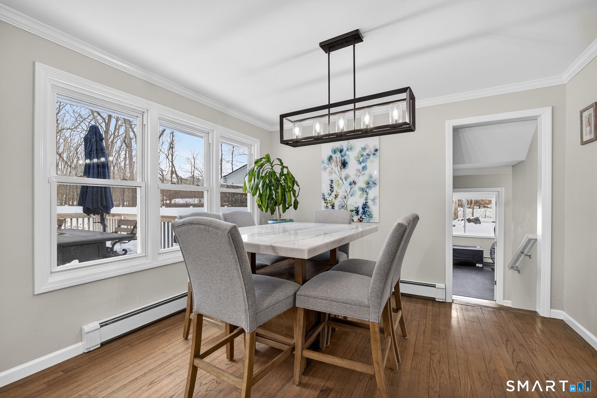 375 Sea Hill Road North Branford, CT 06471 - Photo 12 of 40 a view of a dining room with furniture window and wooden floor