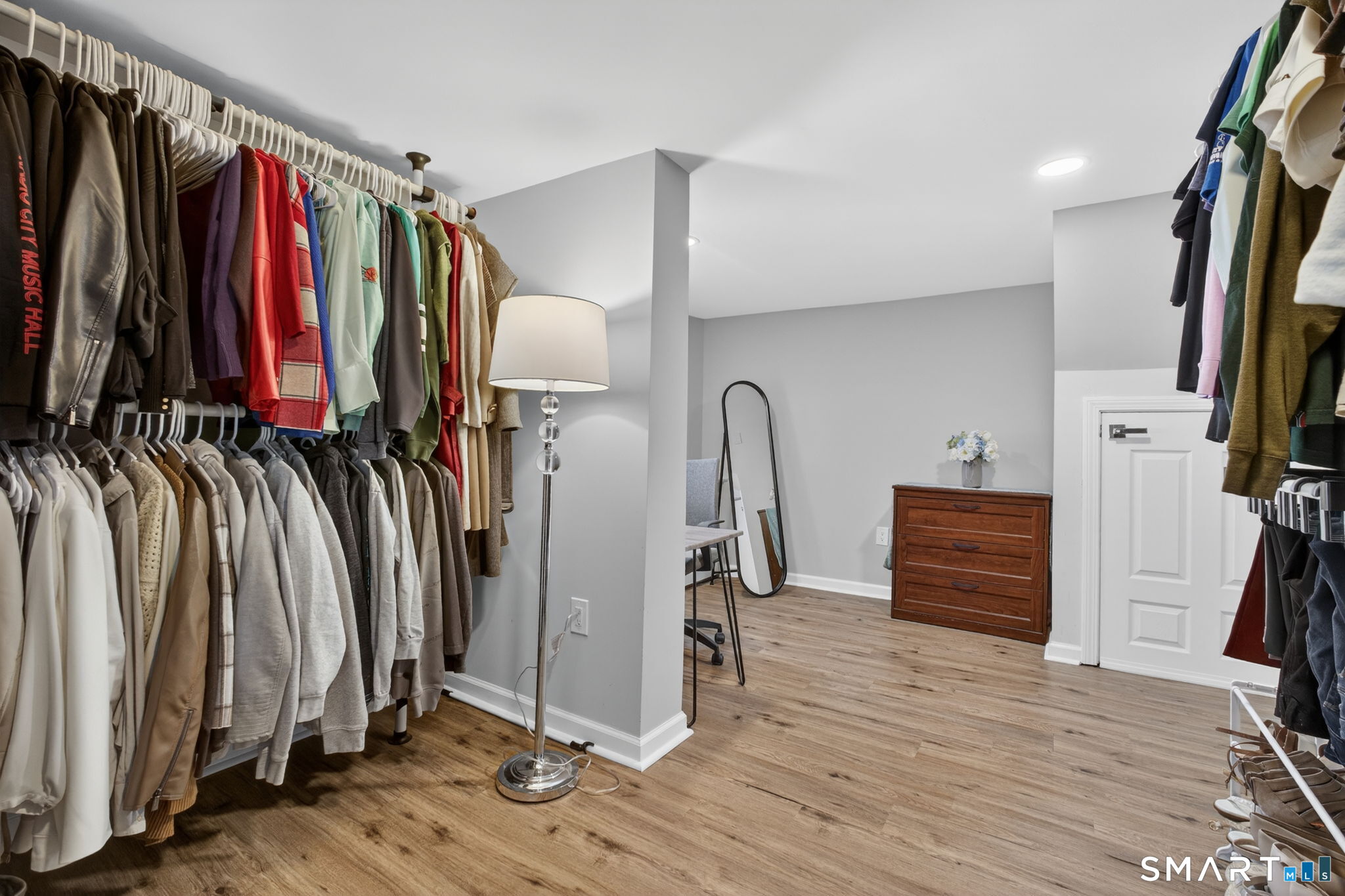 375 Sea Hill Road North Branford, CT 06471 - Photo 18 of 40 a view of walk in closet with clothes and shoes