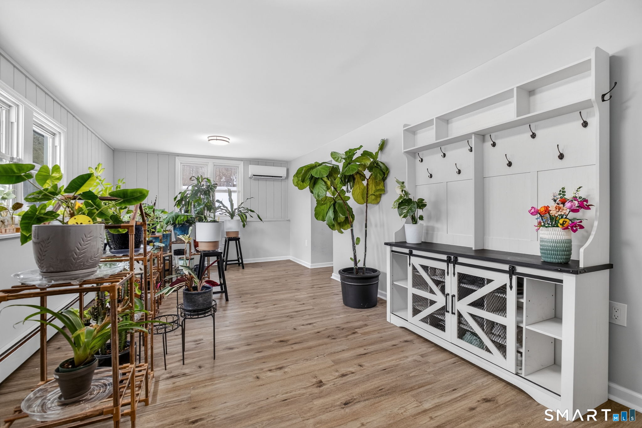 375 Sea Hill Road North Branford, CT 06471 - Photo 19 of 40 a view of a workspace with furniture and wooden floor