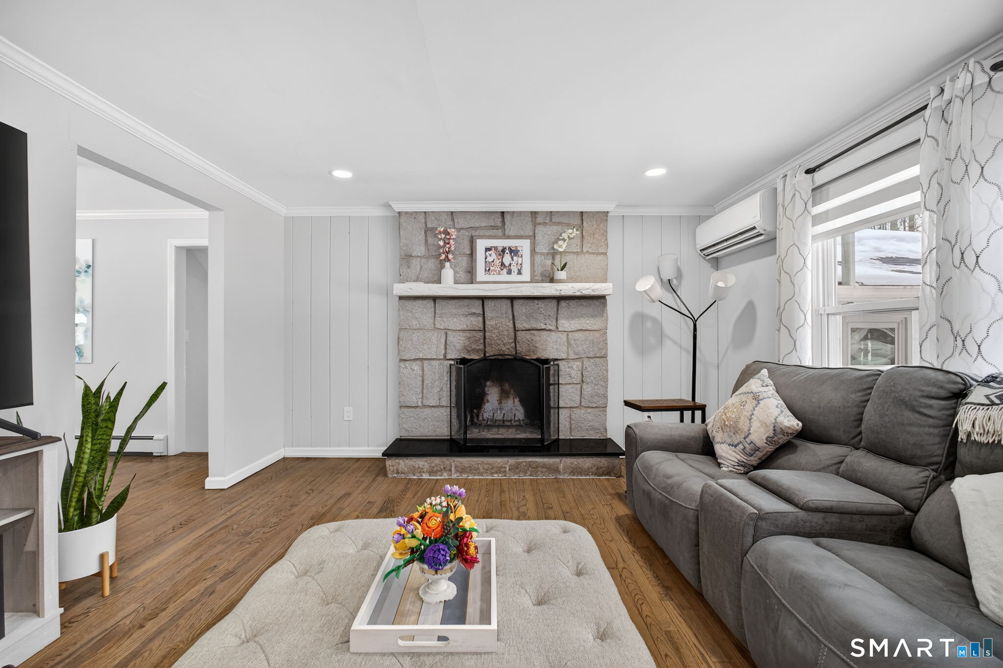 375 Sea Hill Road North Branford, CT 06471 - Photo 3 of 40 a living room with furniture and a fireplace