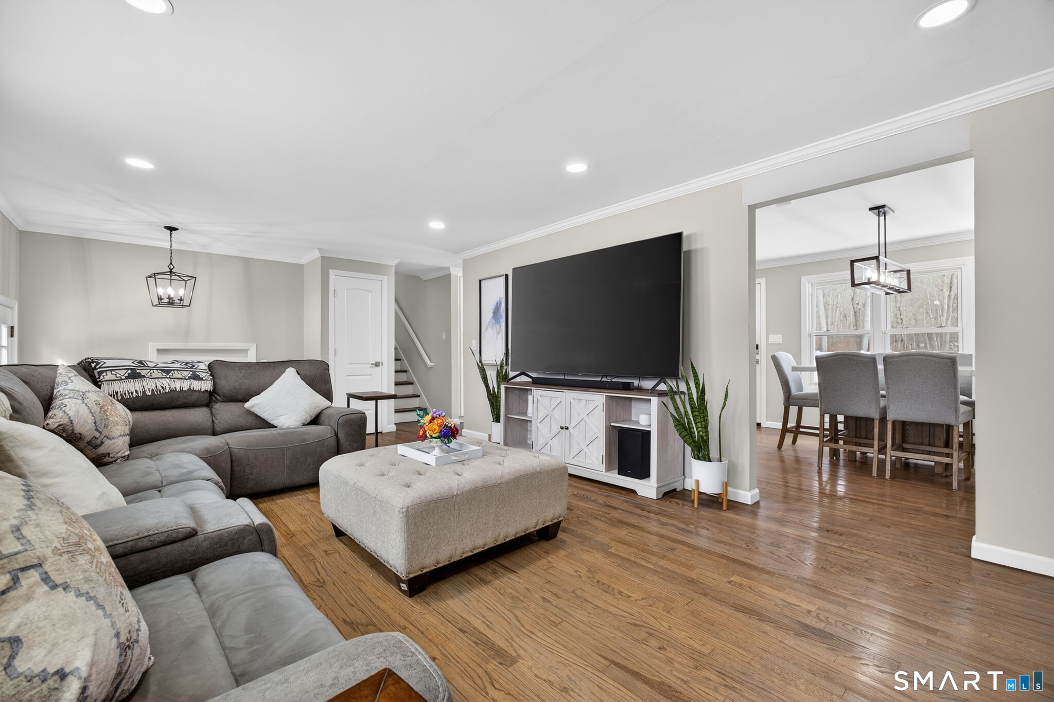 375 Sea Hill Road North Branford, CT 06471 - Photo 4 of 40 a living room with furniture and a flat screen tv