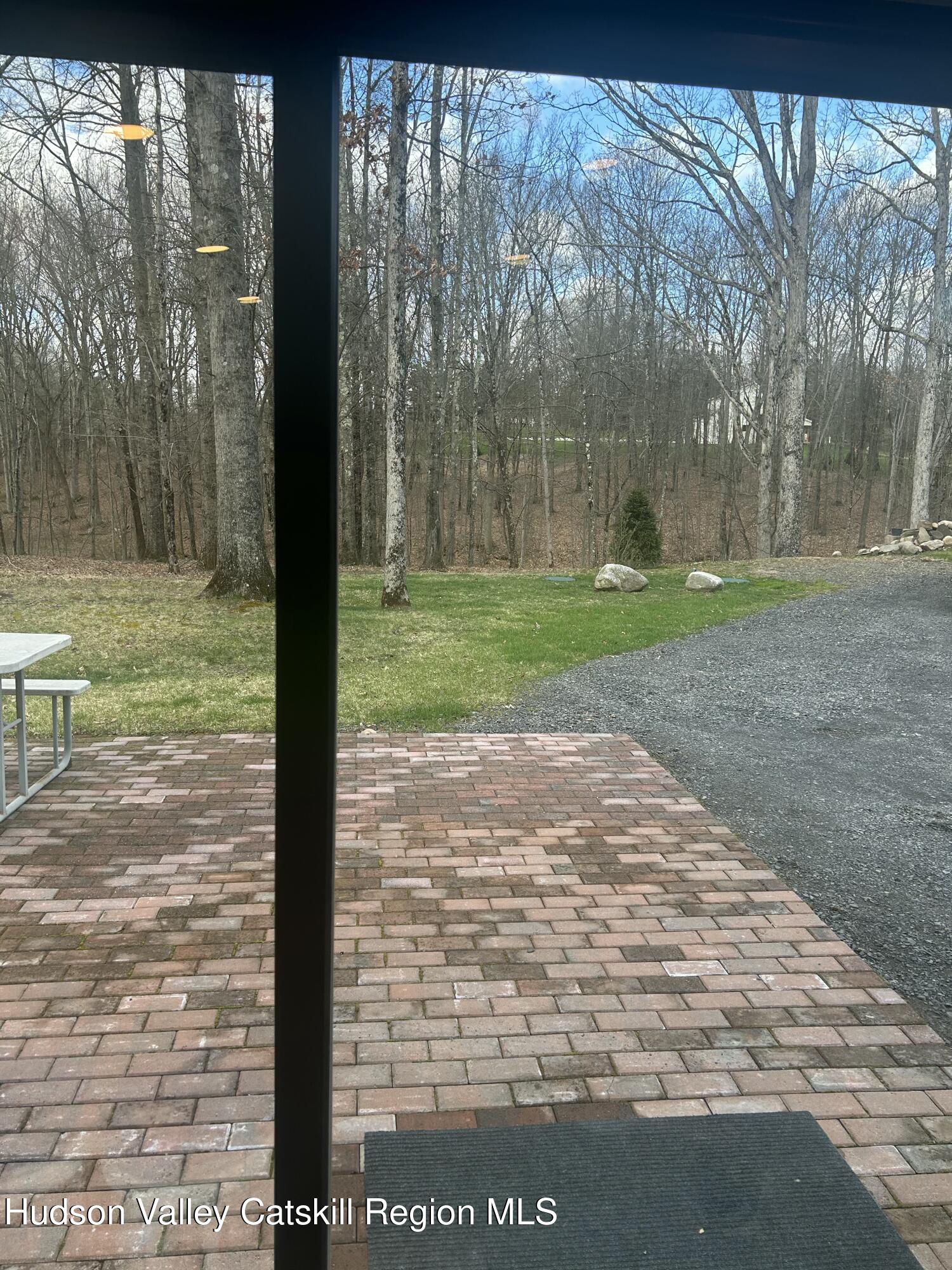 72 Forest Glen Road, Unit STUDIO Gardiner, NY 12561 - Photo 12 of 15 a view of a yard with a tree