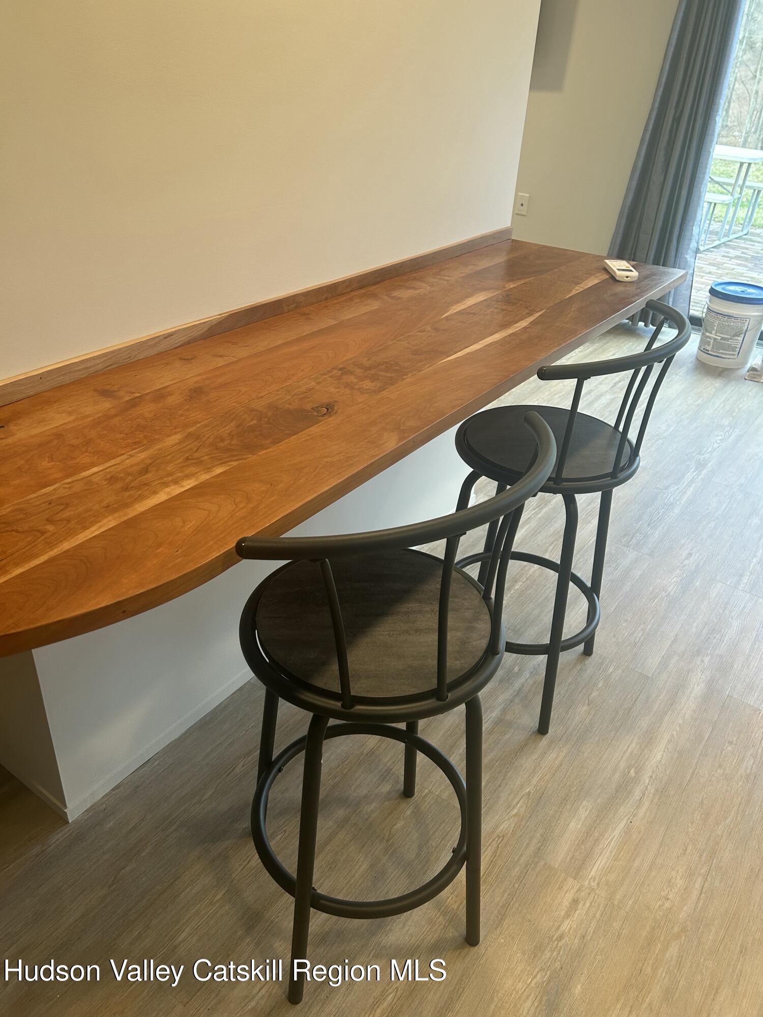 72 Forest Glen Road, Unit STUDIO Gardiner, NY 12561 - Photo 4 of 15 a view of swimming pool with a table and chairs