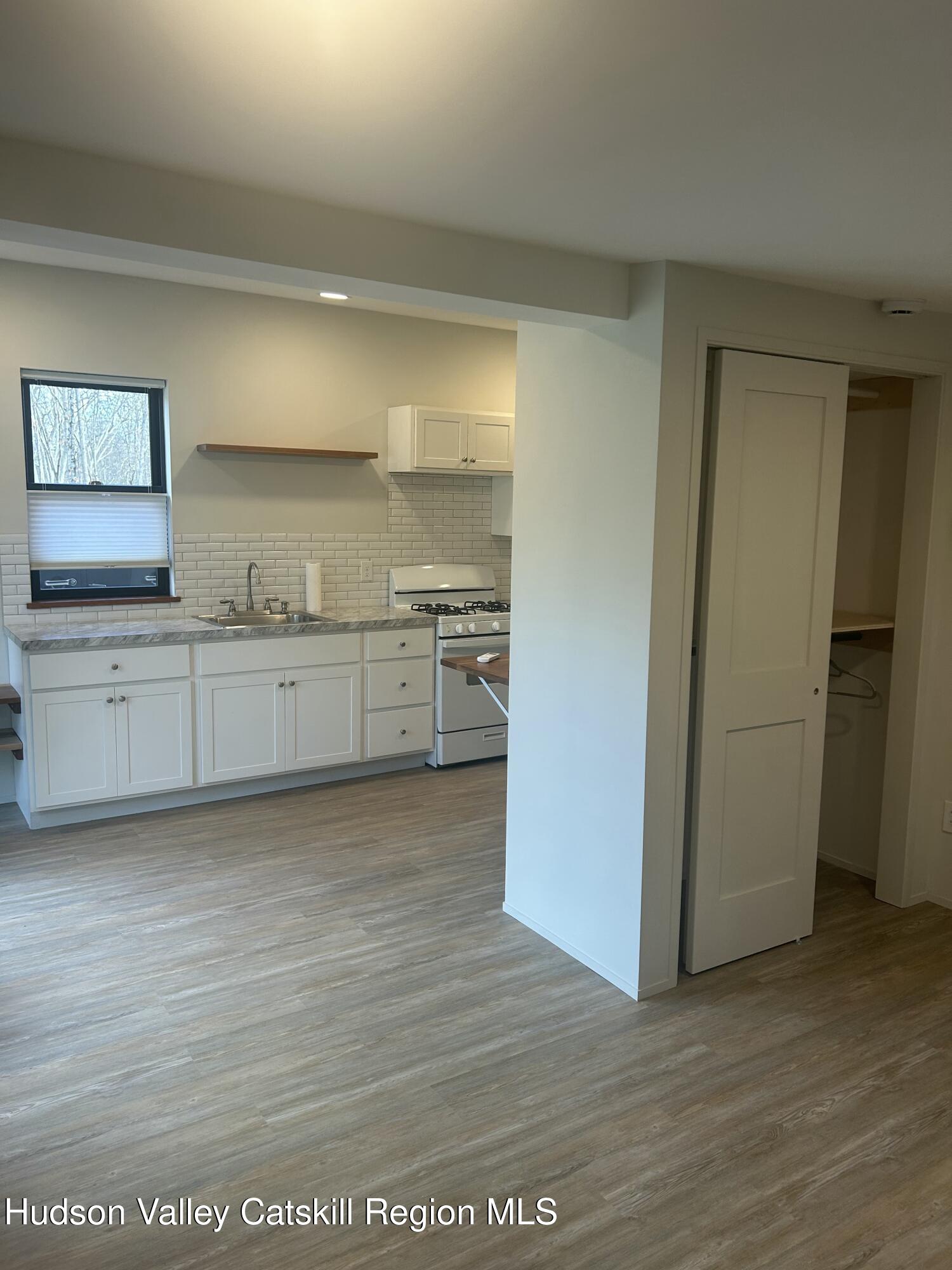 72 Forest Glen Road, Unit STUDIO Gardiner, NY 12561 - Photo 6 of 15 a view with cabinets and wooden floor