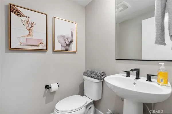 a bedroom with a bed and a table in it