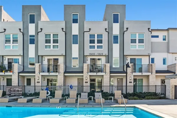a tall building sitting on top of a street