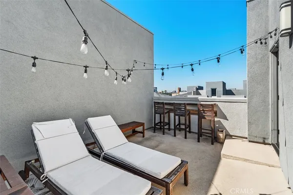 a kitchen with a table and chairs in it