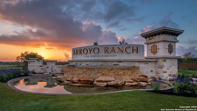 a view of swimming pool with seating