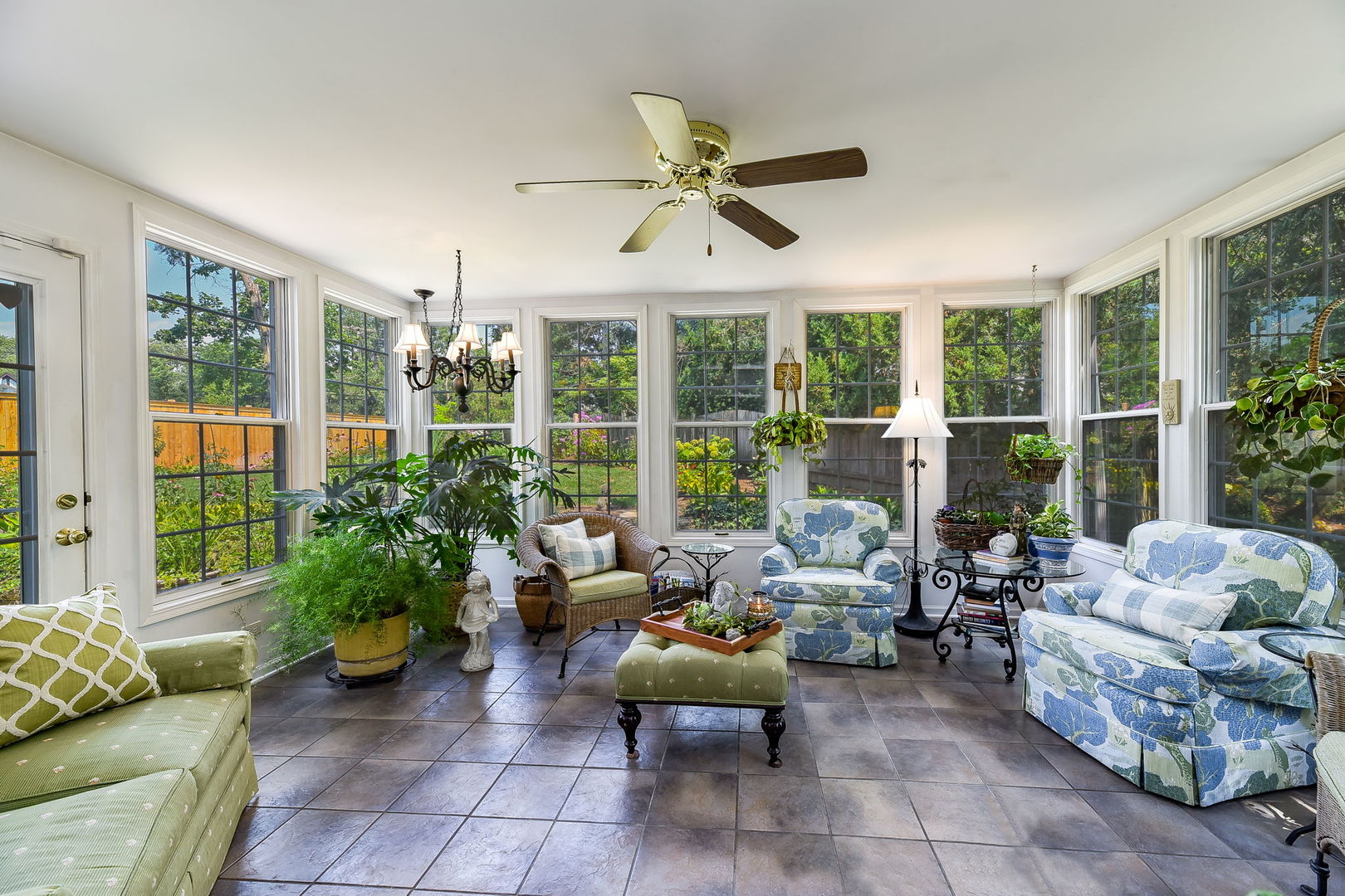 1S771 Carrol Gate Road Wheaton, IL 60189 - Photo 16 of 42 a living room with furniture and a large window