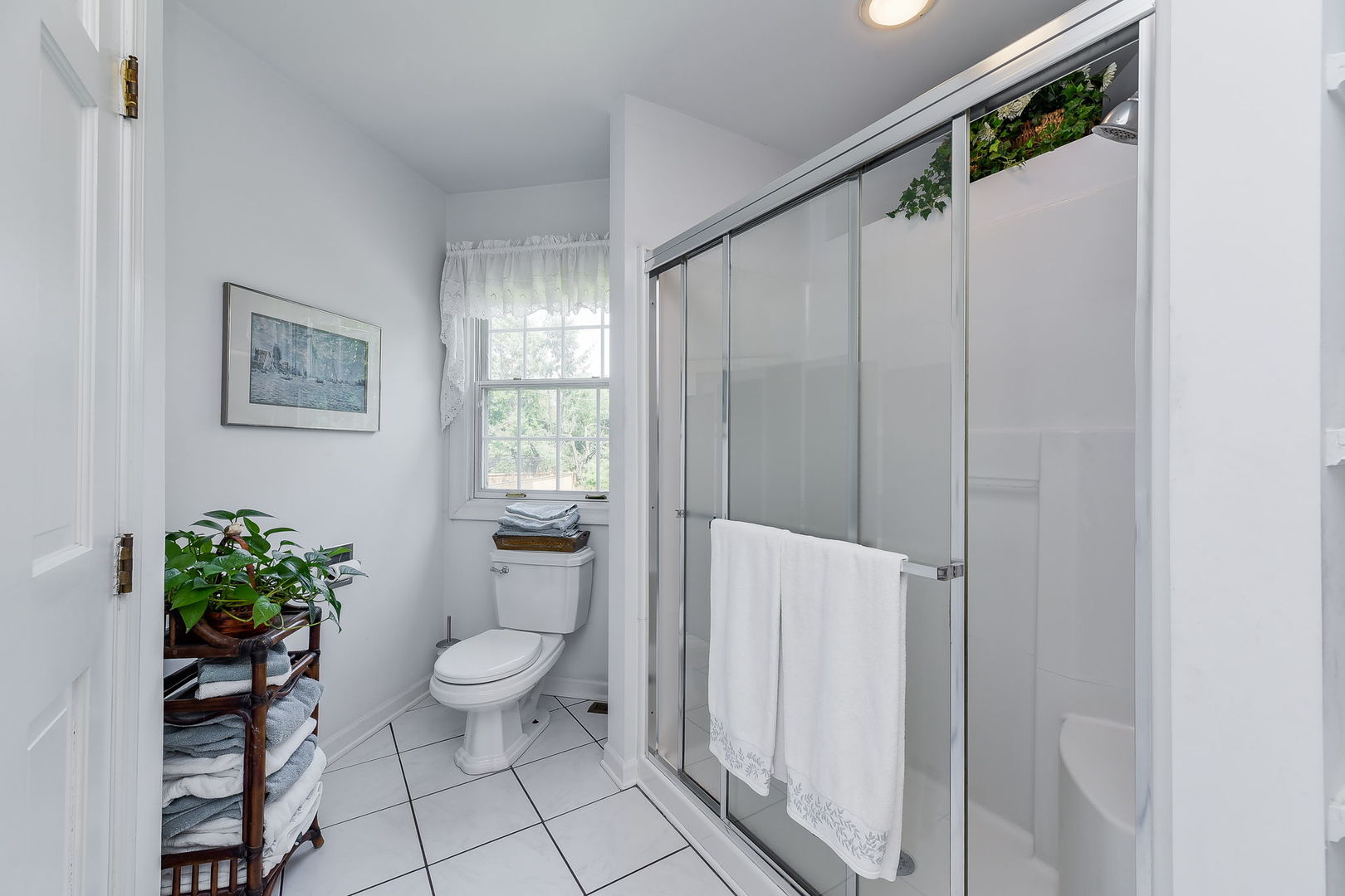 1S771 Carrol Gate Road Wheaton, IL 60189 - Photo 23 of 42 a bathroom with a toilet and a shower