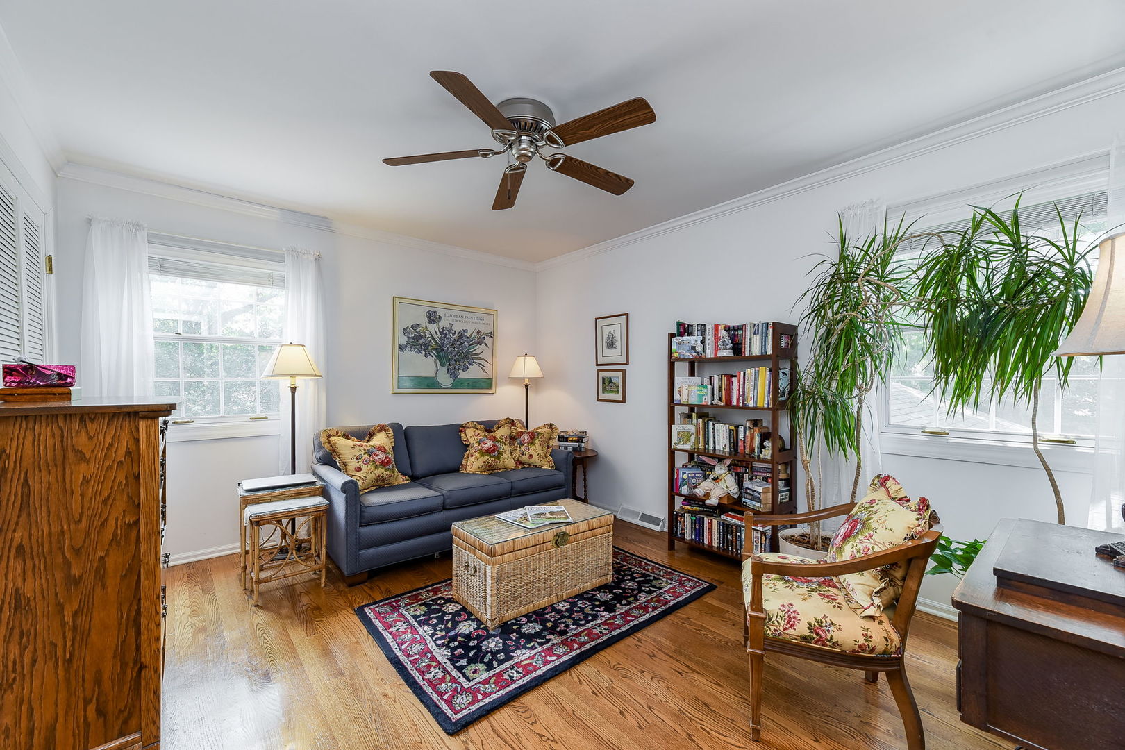 1S771 Carrol Gate Road Wheaton, IL 60189 - Photo 24 of 42 a living room with furniture rug and a large window