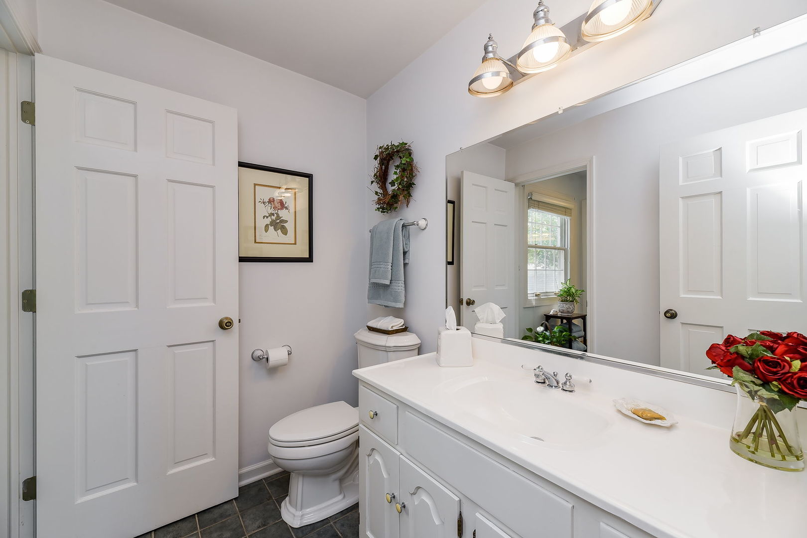 1S771 Carrol Gate Road Wheaton, IL 60189 - Photo 28 of 42 a bathroom with a sink vanity granite and toilet