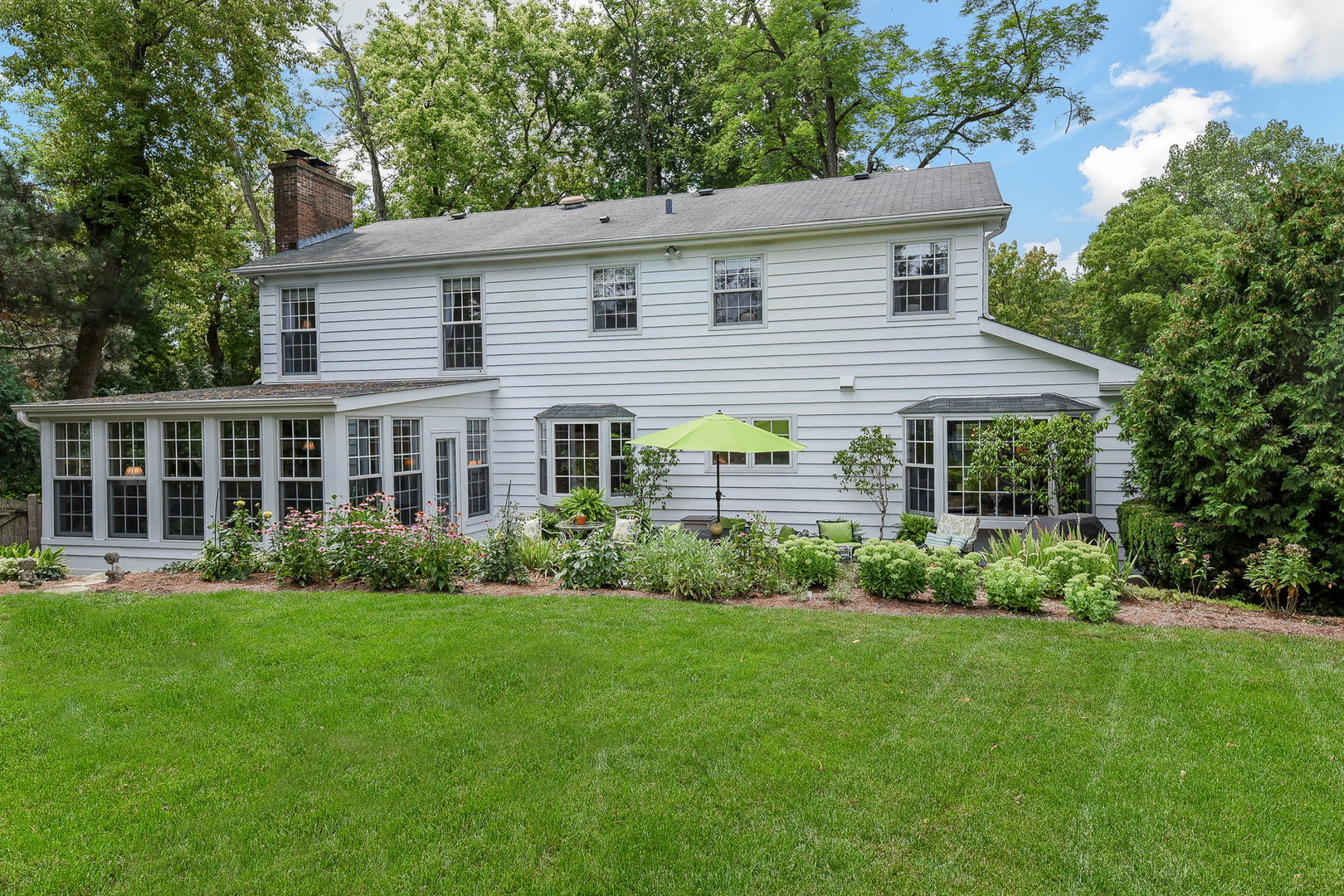 1S771 Carrol Gate Road Wheaton, IL 60189 - Photo 39 of 42 a front view of house with yard and green space