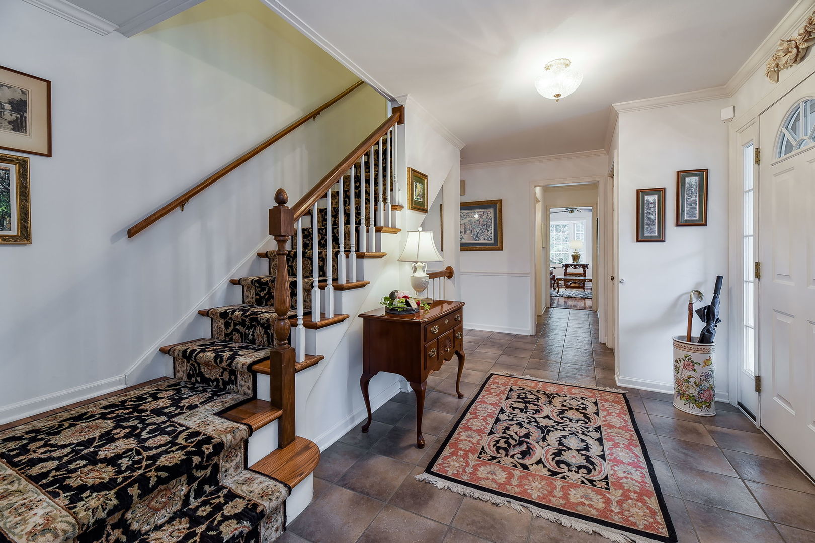 1S771 Carrol Gate Road Wheaton, IL 60189 - Photo 5 of 42 a living room with furniture and a rug