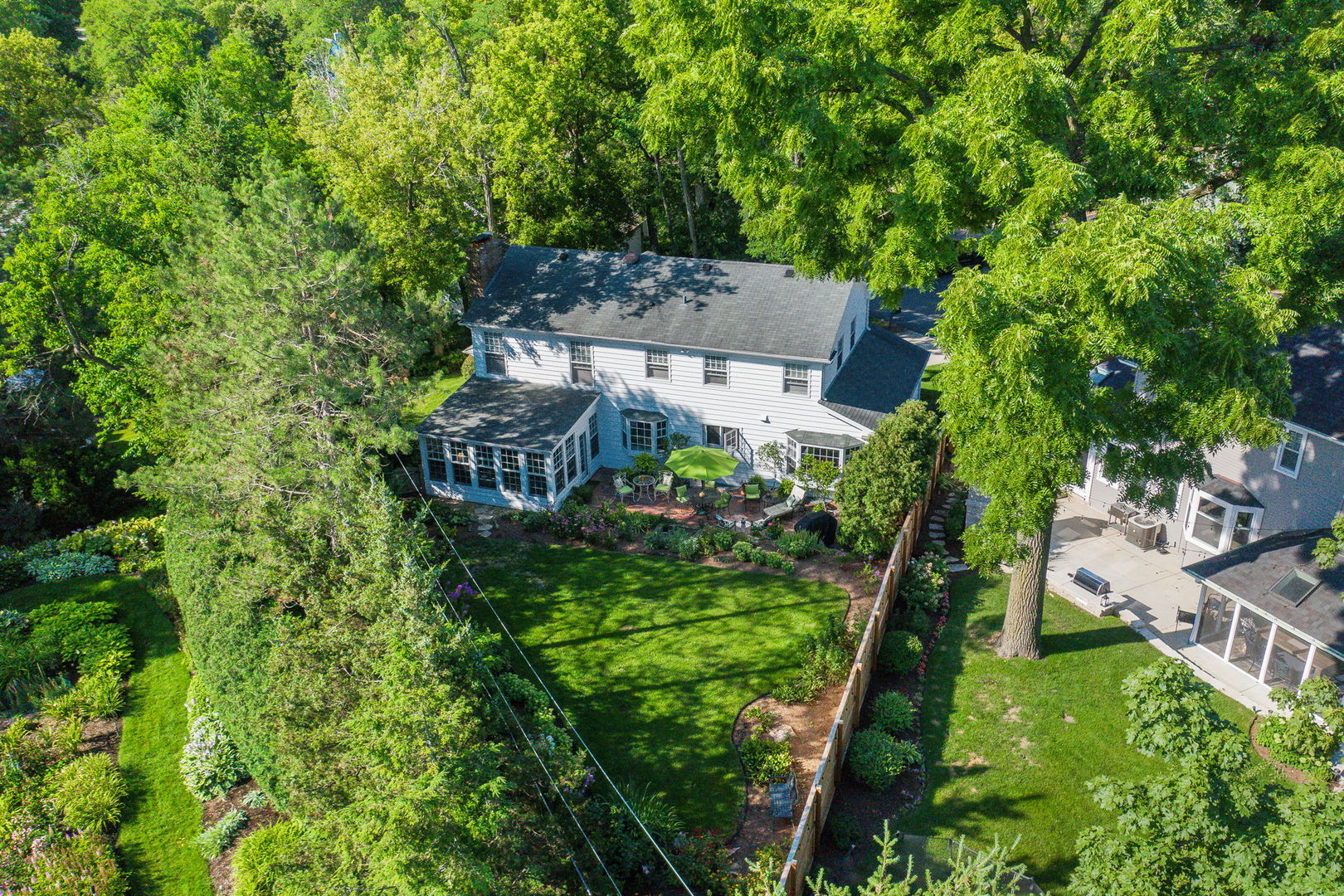 1S771 Carrol Gate Road Wheaton, IL 60189 - Photo 41 of 42 an aerial view of a house with a garden