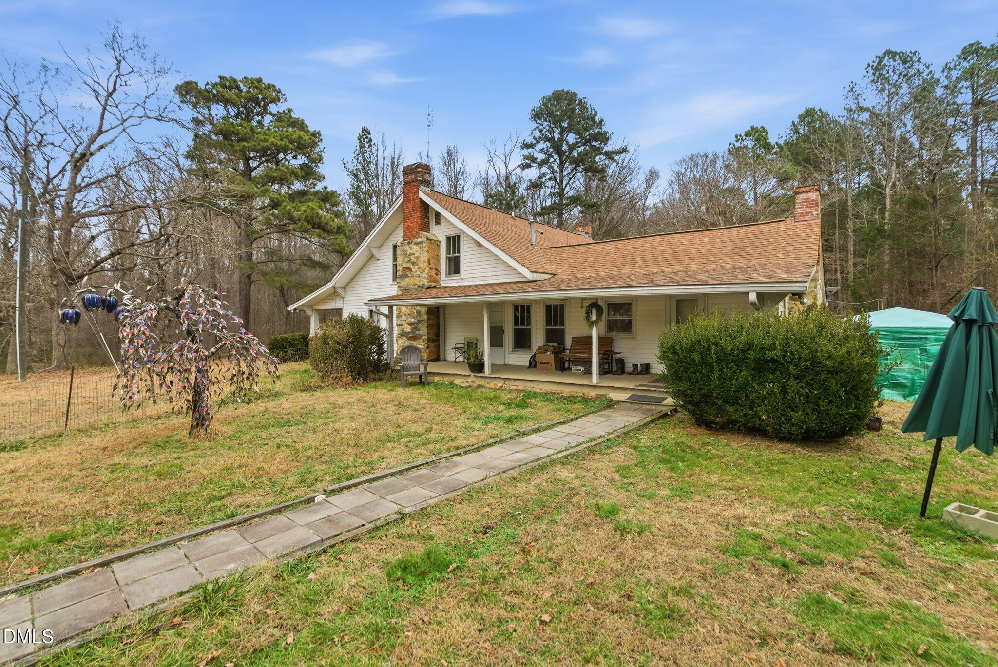 2319 White Cross Road Chapel Hill, NC 27516 - Photo 9 of 28 a view of a house with a yard and potted plants