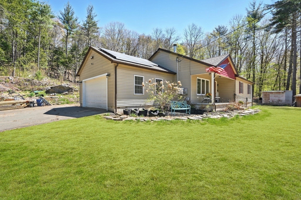 47 Old Chester Road Huntington, MA 01050 - Photo 24 of 36 a front view of house with yard and trees