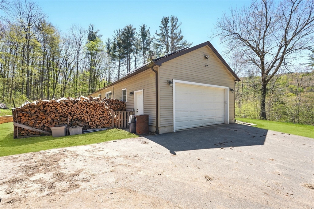 47 Old Chester Road Huntington, MA 01050 - Photo 30 of 36 a view of backyard of house and trees in the background