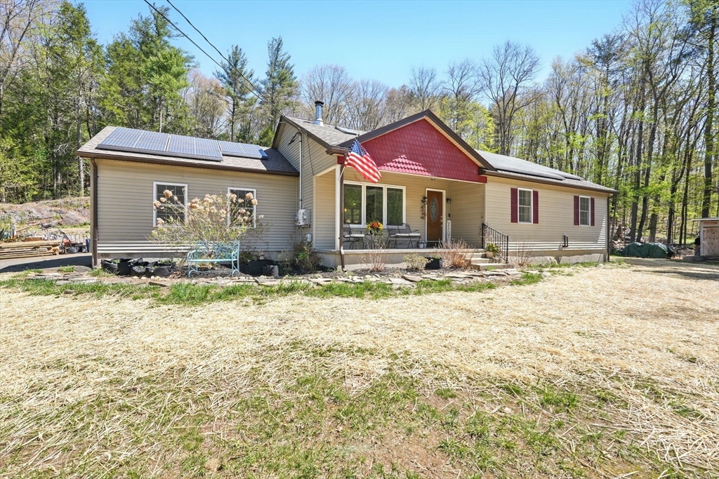 47 Old Chester Road Huntington, MA 01050 - Photo 32 of 36 a front view of a house with a yard