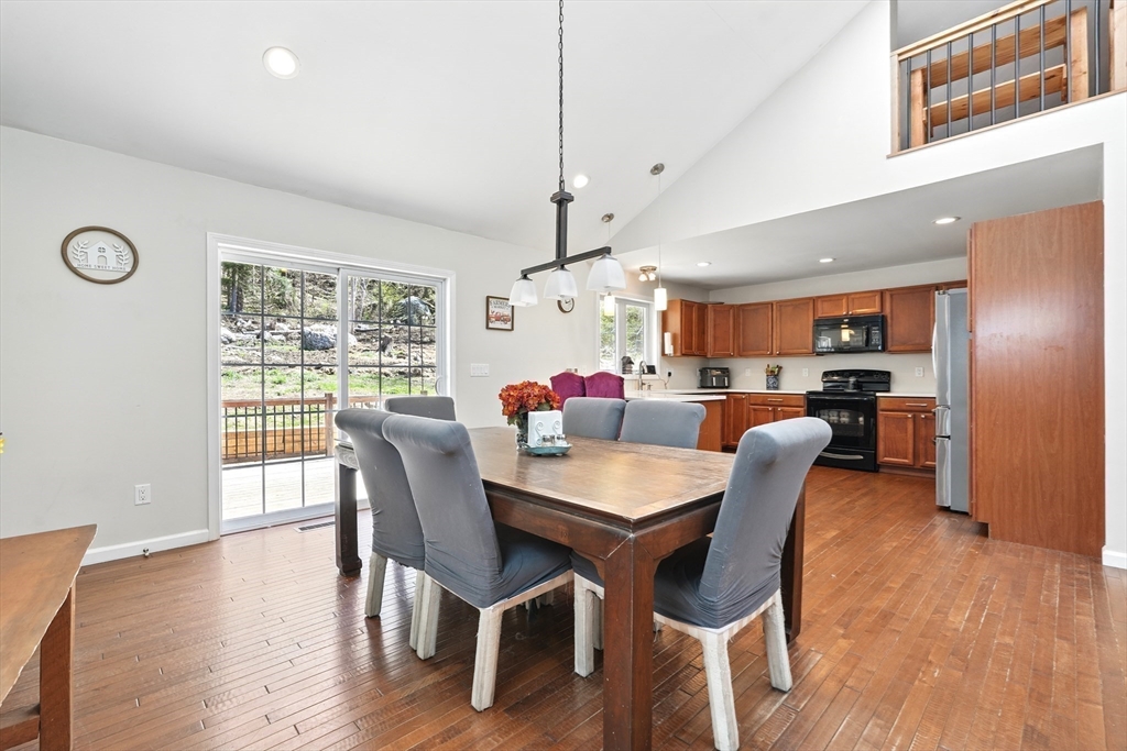 47 Old Chester Road Huntington, MA 01050 - Photo 8 of 36 a view of a dining room with furniture window and wooden floor