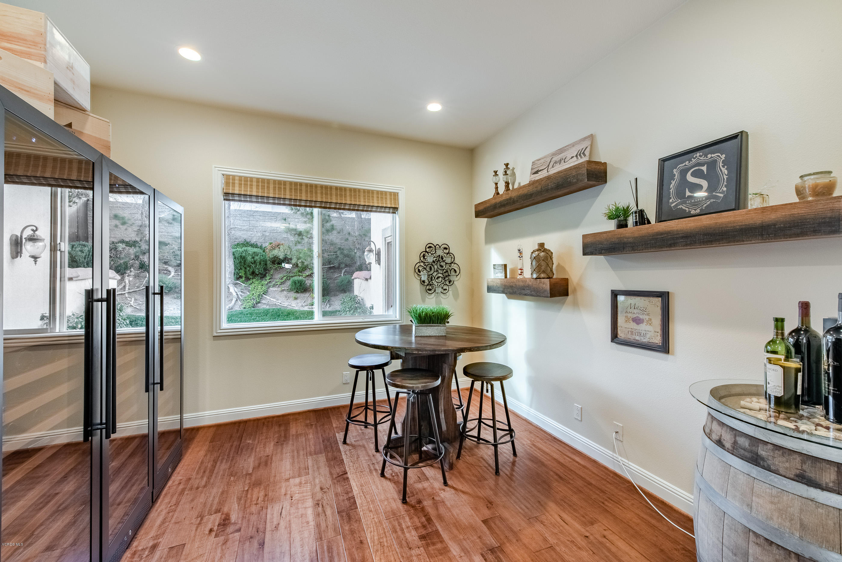 12354 Nelson Road Moorpark, CA 93021 - Photo 22 of 65 a workspace with furniture window and wooden floor