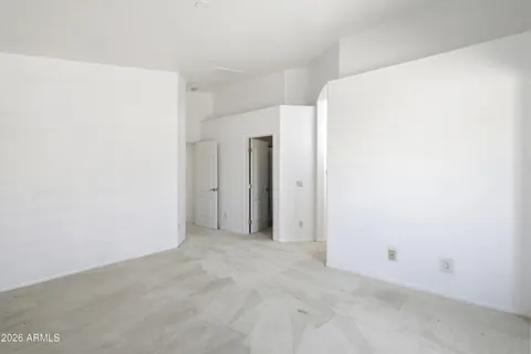 a bathroom with a shower sink and mirror