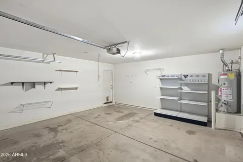 a bathroom with a shower and a window