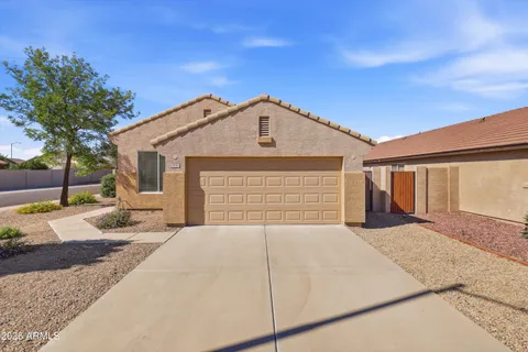 a front view of a house with a garage