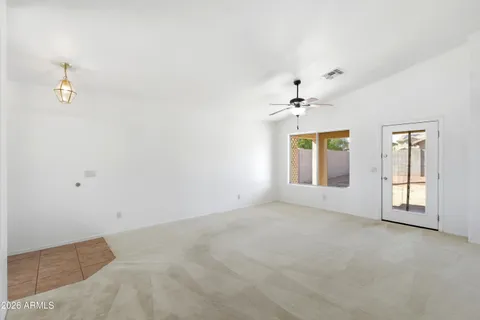 a view of an empty room with window