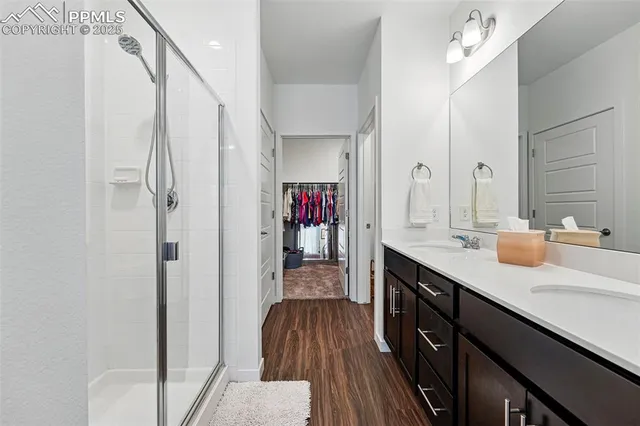 a bathroom with a sink and mirror
