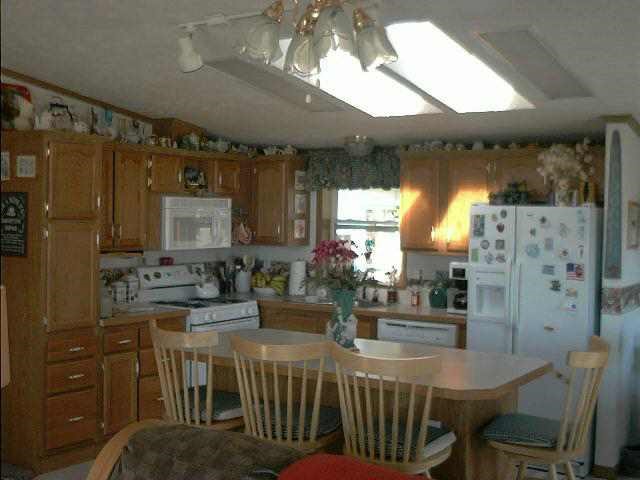 5895 South Clover Road Freeport, IL 61032 - Photo 8 of 8 a view of a dining room with furniture and window
