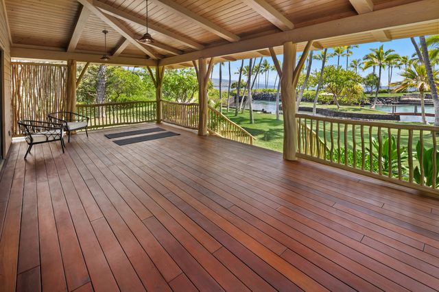 a view of porch with wooden floor