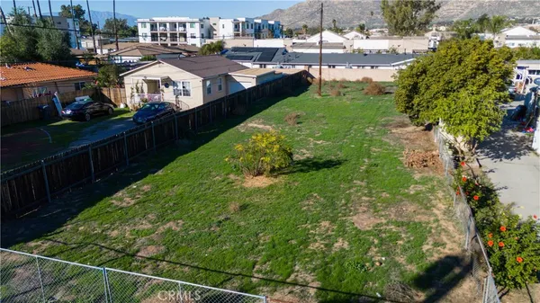 a aerial view of a house with a yard