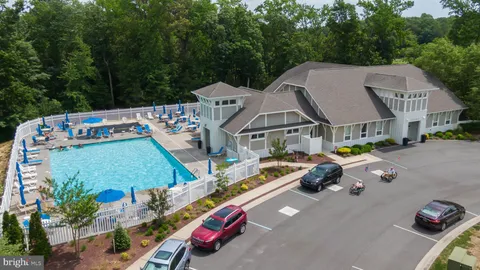 an aerial view of a house with lake view