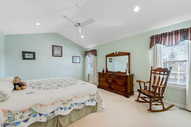 a bedroom with a bed and furniture