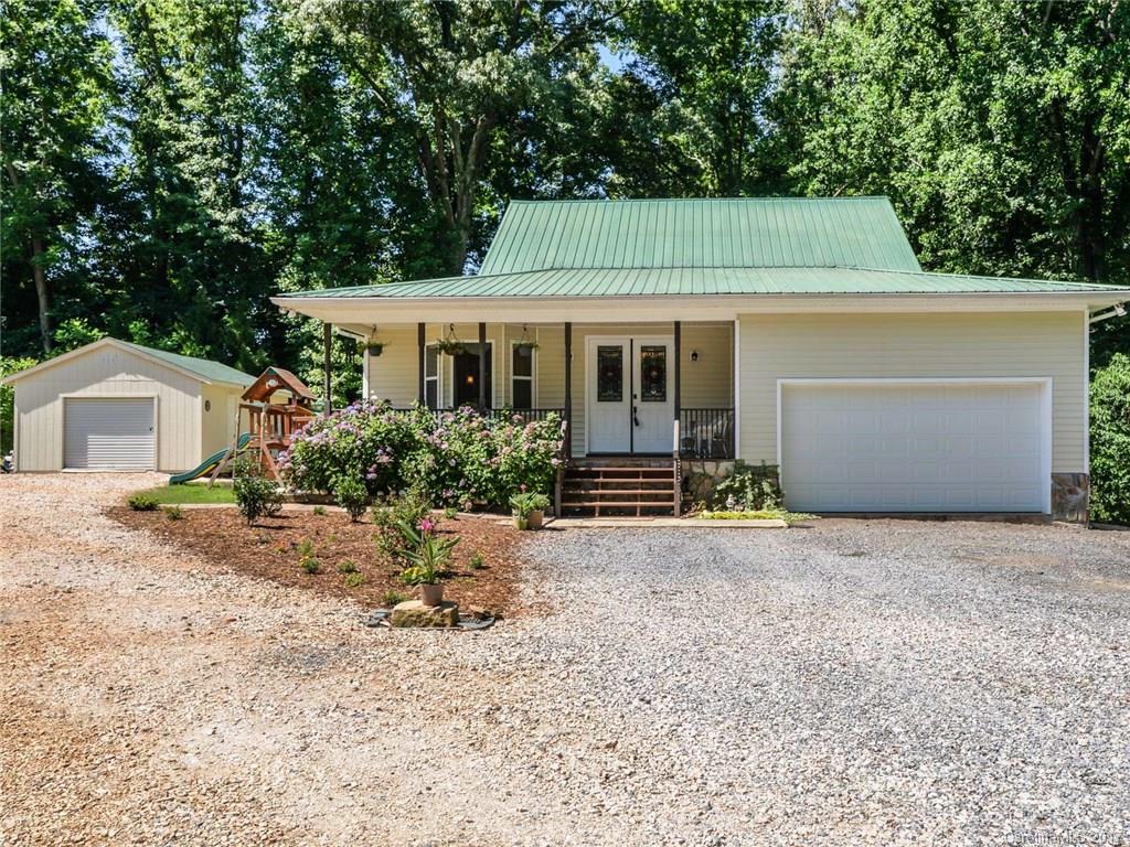 2789 Bush Road Clover, SC 29710 - Photo 1 of 24 a view of a house with a yard and potted plants