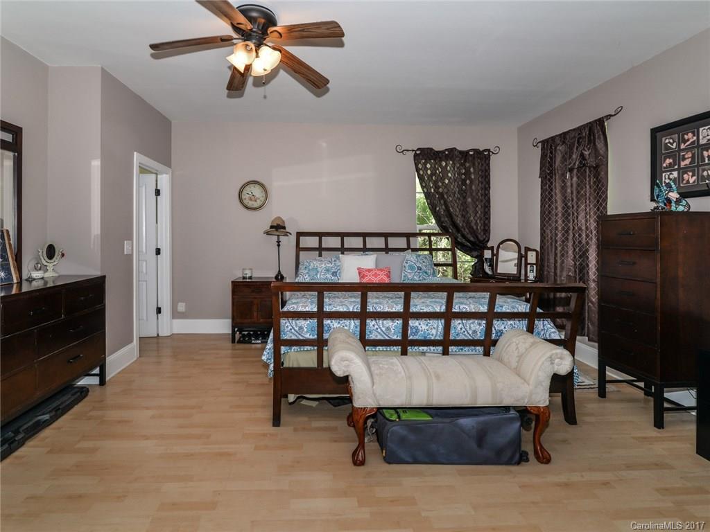 2789 Bush Road Clover, SC 29710 - Photo 15 of 24 a living room with furniture a flat screen tv and a table