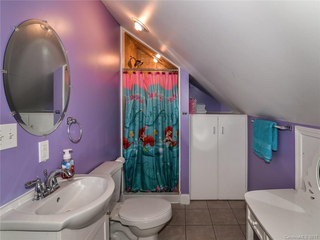 2789 Bush Road Clover, SC 29710 - Photo 22 of 24 a bathroom with a sink toilet and shower