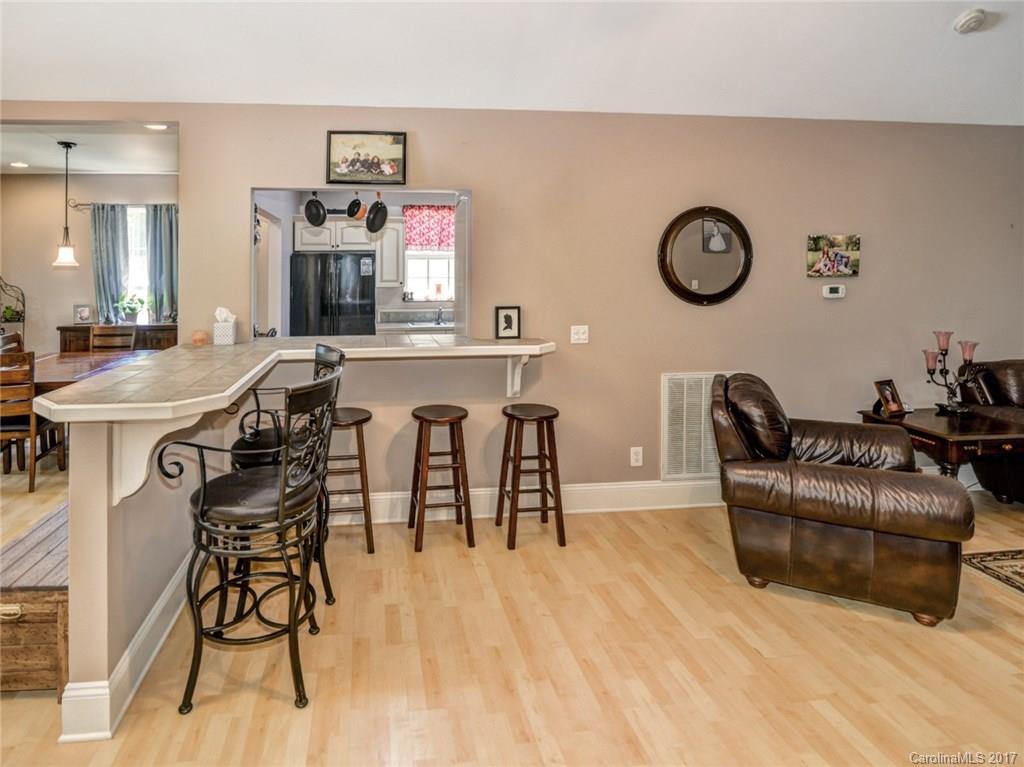 2789 Bush Road Clover, SC 29710 - Photo 10 of 24 a living room with furniture a flat screen tv and a table