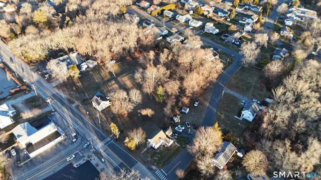 a view of road with houses