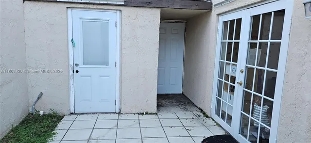 a view of entryway with a front door