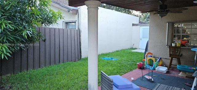 a view of yard with seating space